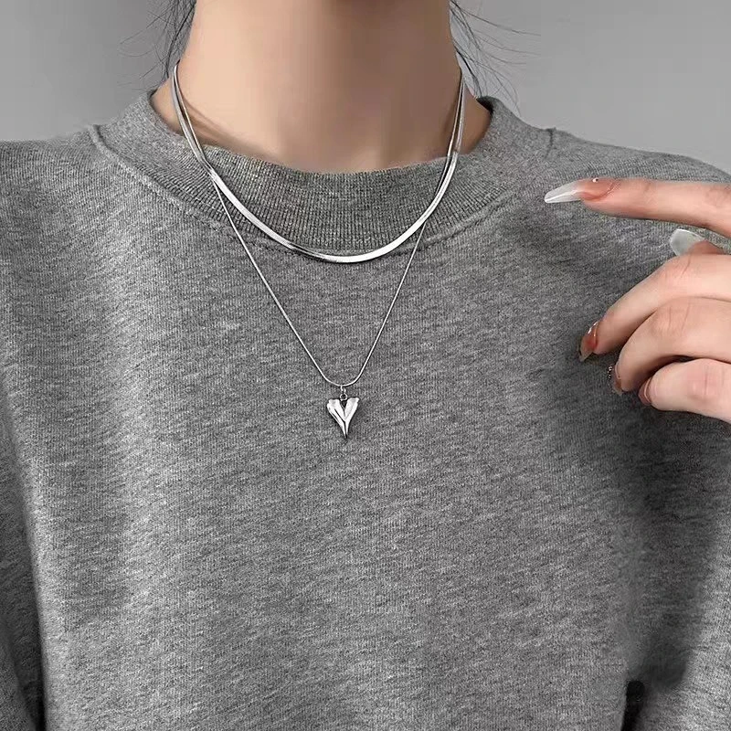 Silver chain necklace with heart